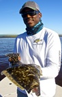 SCAD fishing club head coach with a nice flounder out of Hilton Head Island