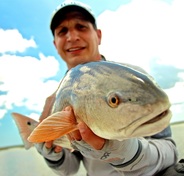Brian with another of the many redfish he has caught in the boat. Hilton Head Island Fly Fishing