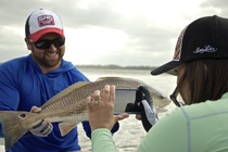 One of the many reds on fly for this couple . Fly Fishing Hilton Head Island South Carolina